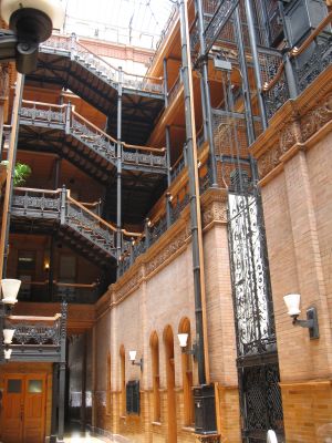 Photo of the Bradbury building, with stairs in the background.