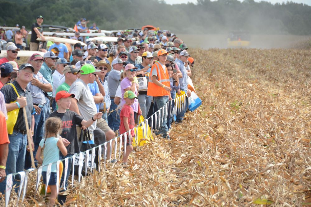 Photo of crowd looking out over a farm field at 2023 Farm Progress Show.