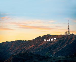 Photo of Hollywood sign and radio tower in Los Angeles.