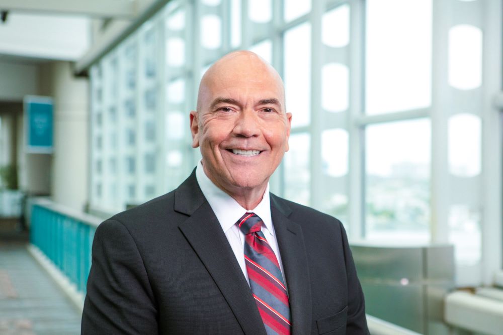 Photo of Larry Sieg, standing in the Atlantic City Convention Center.