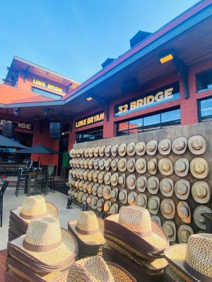 Photo of cowboy hat wall at Luke Bryan's Nashville honky-tonk.