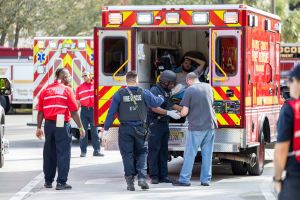 Photo of ambulance and safety personnel.