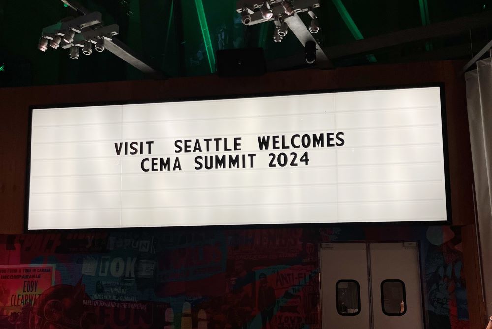 Photo of Visit Seattle sign welcoming attendees to CEMA Summit 2024.