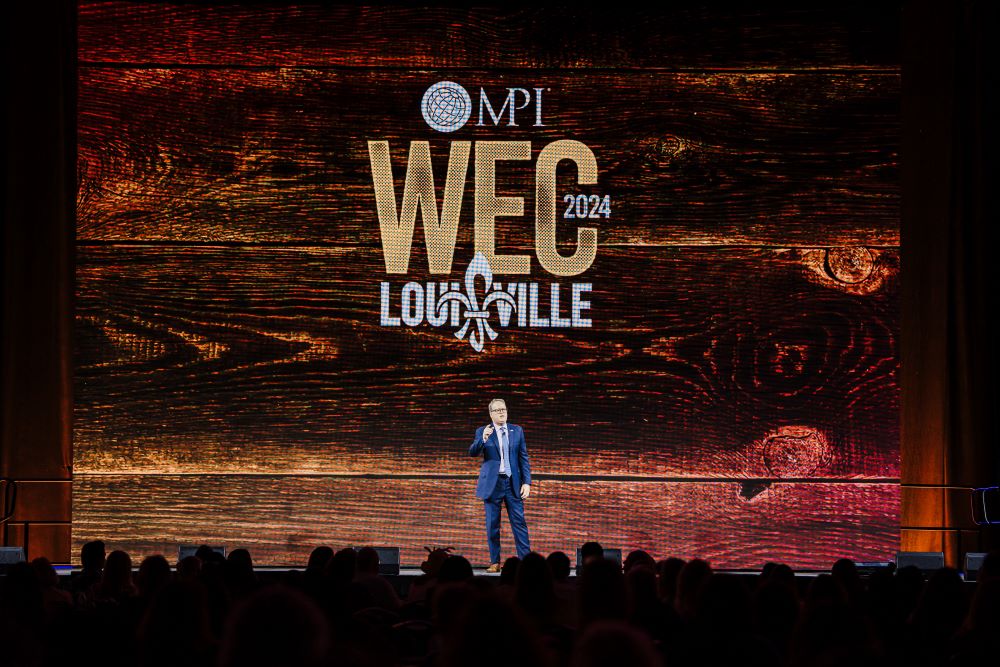 Photo of Paul Van Deventer on stage at MPI WEC.