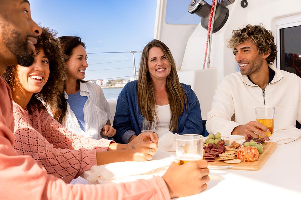 Group enjoying a meal on a boat in Ocean City, MD