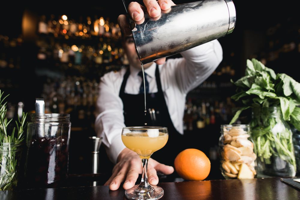 Bartender making a craft cocktail in Ann Arbor, Michigan