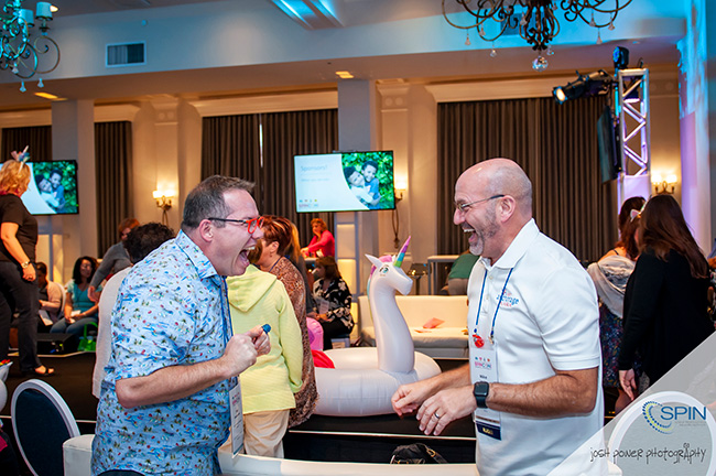 SPINCon 2018 Attendees After a High Five, Credit: Josh Power Photography