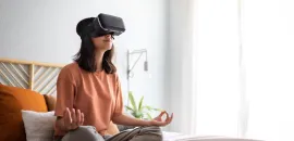 Woman Meditates With VR Headset