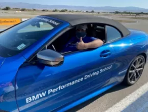 Tyler Davidson prepares to drive a BMW at the BMW Performance Driving School.