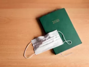 2020 planner notebook with a mask on top