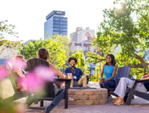 Meeting attendees sitting in a circle outside in Reno Tahoe