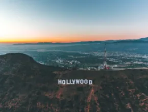 Photo of Hollywood sign in Los Angeles at sunset.