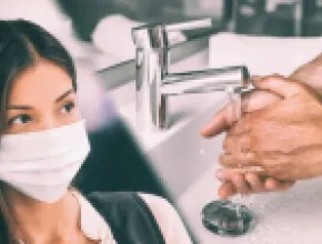 Collage of a woman with a mask and a person washing their hands under a faucet on the right.