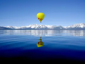 Photo of a hot-air balloon over Lake Tahoe.