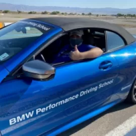 Tyler Davidson prepares to drive a BMW at the BMW Performance Driving School.