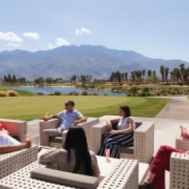 Group of attendees meeting outside in Palm Springs