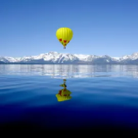 Photo of a hot-air balloon over Lake Tahoe.