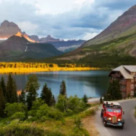 Red bus tour in Glacier National Park’s Many Glacier Valley.