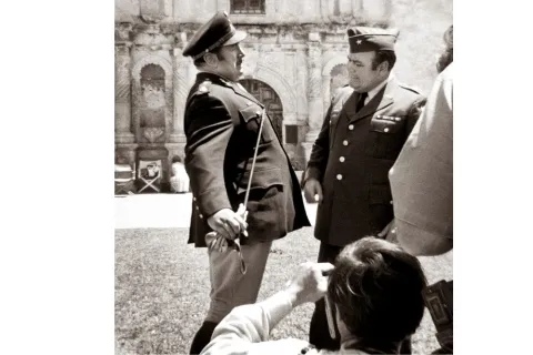 Actors Peter Ustinov and Jonathan Winters rehearsing in front of the Alamo for Viva Max!, 1969.
