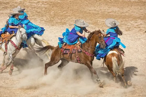“Escaramuza” is the only female equestrian event in charrería, or Mexican rodeo. Here, women rider in San Antonio showcase their riding skills in this highly choreographed and synchronized “skirmish."