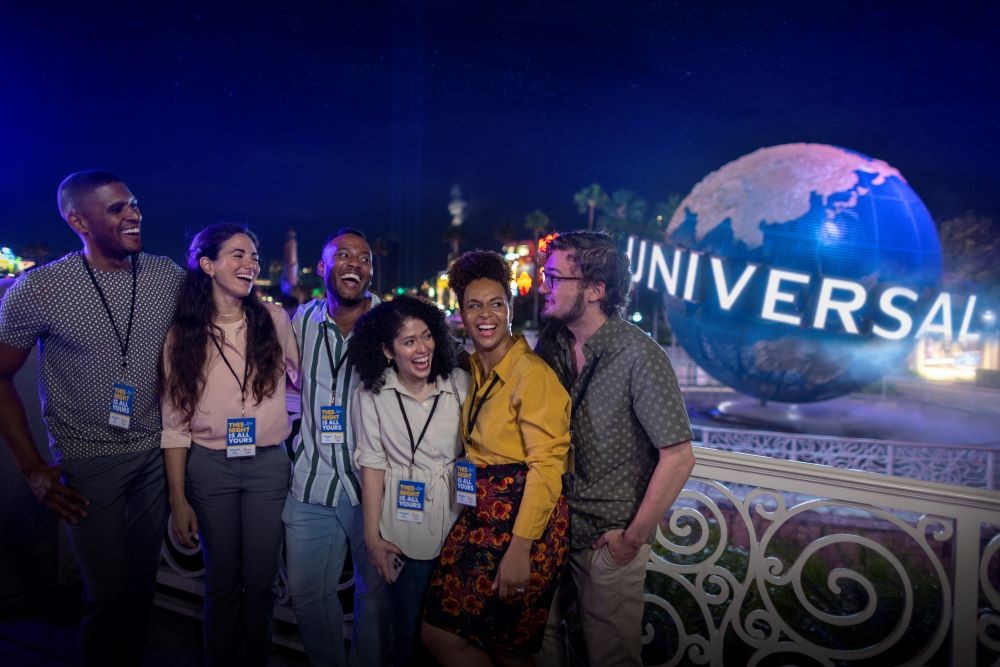 Attendees in front of Universal Orlando globe