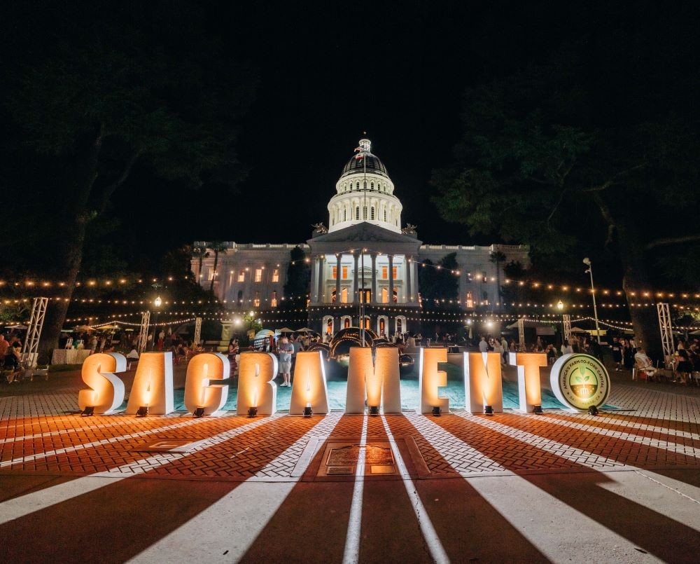 Photo of state capitol of California during night at Legends of Wine 2023 festival.