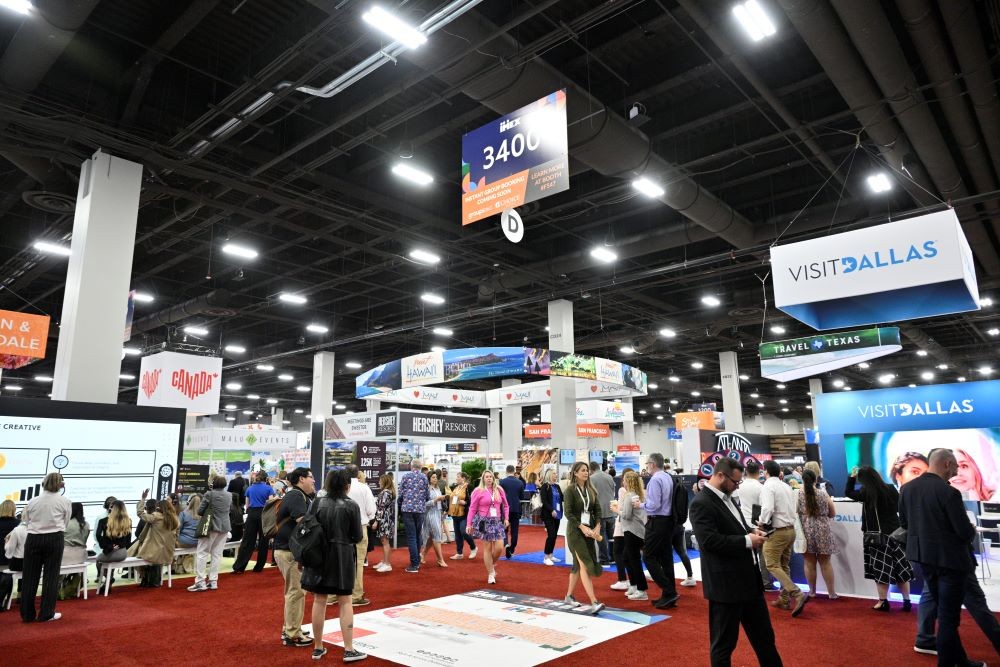 Photo of group of people on the exhibit floor at IMEX America 2023.