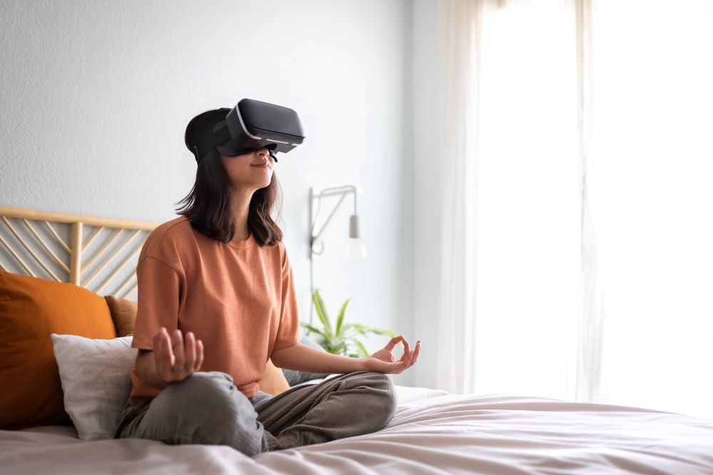 Woman Meditates With VR Headset