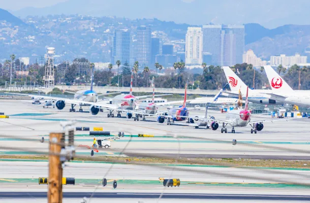 line of planes on tarmac