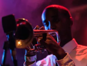 A man plays the trumpet at The Blue Room in Kansas City